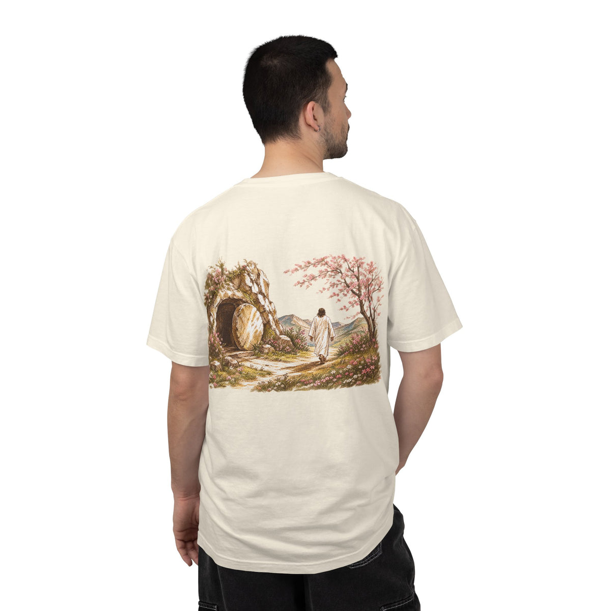 Model wearing ivory Resurrected Tomb Christian graphic tee back – He is Risen biblical streetwear shirt