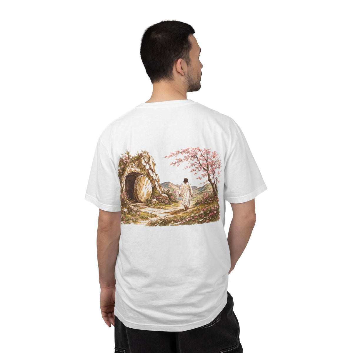 Model wearing white Resurrected Tomb Christian graphic tee back – He is Risen biblical streetwear shirt